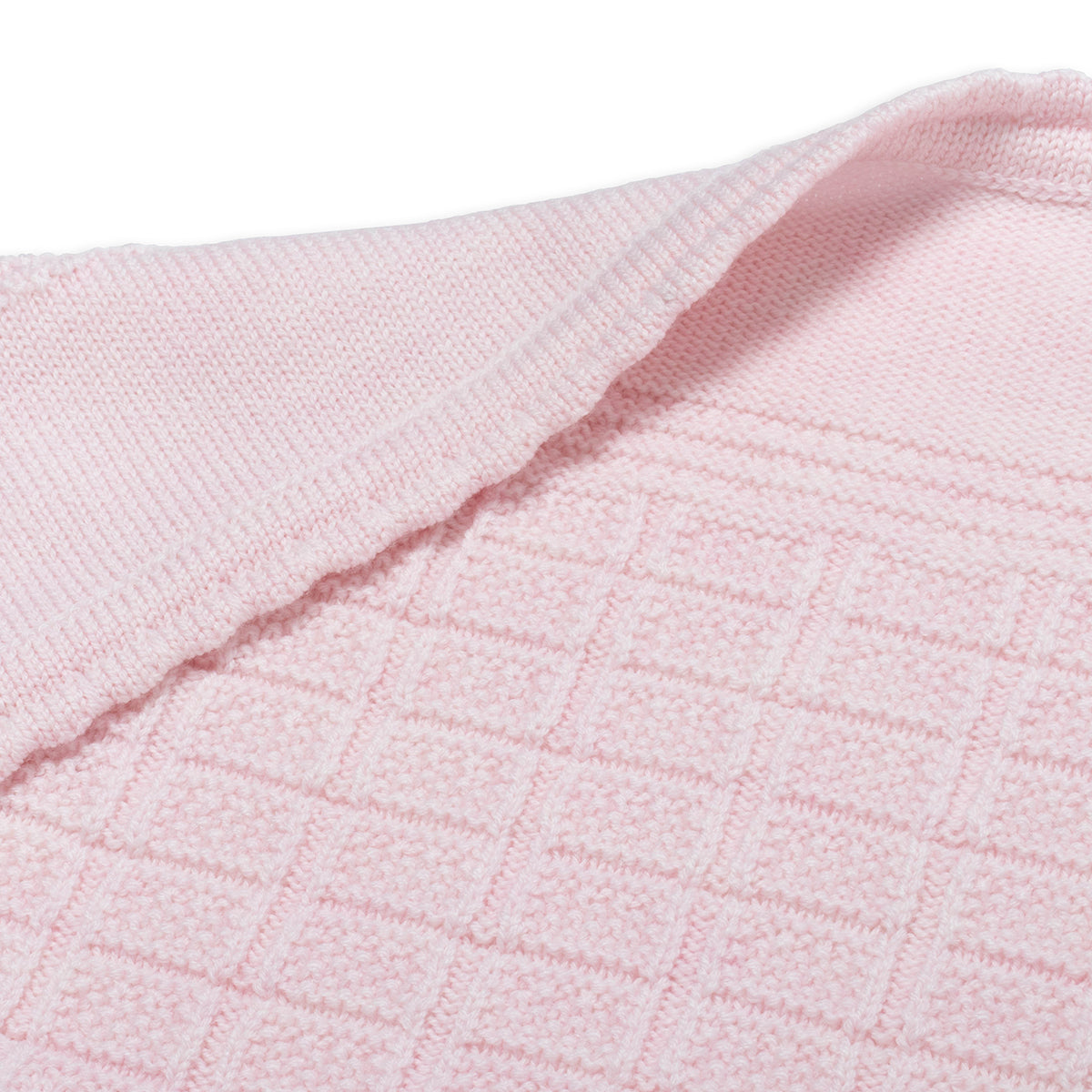 Close-up of pink textured fabric with a subtle pattern, lillelam