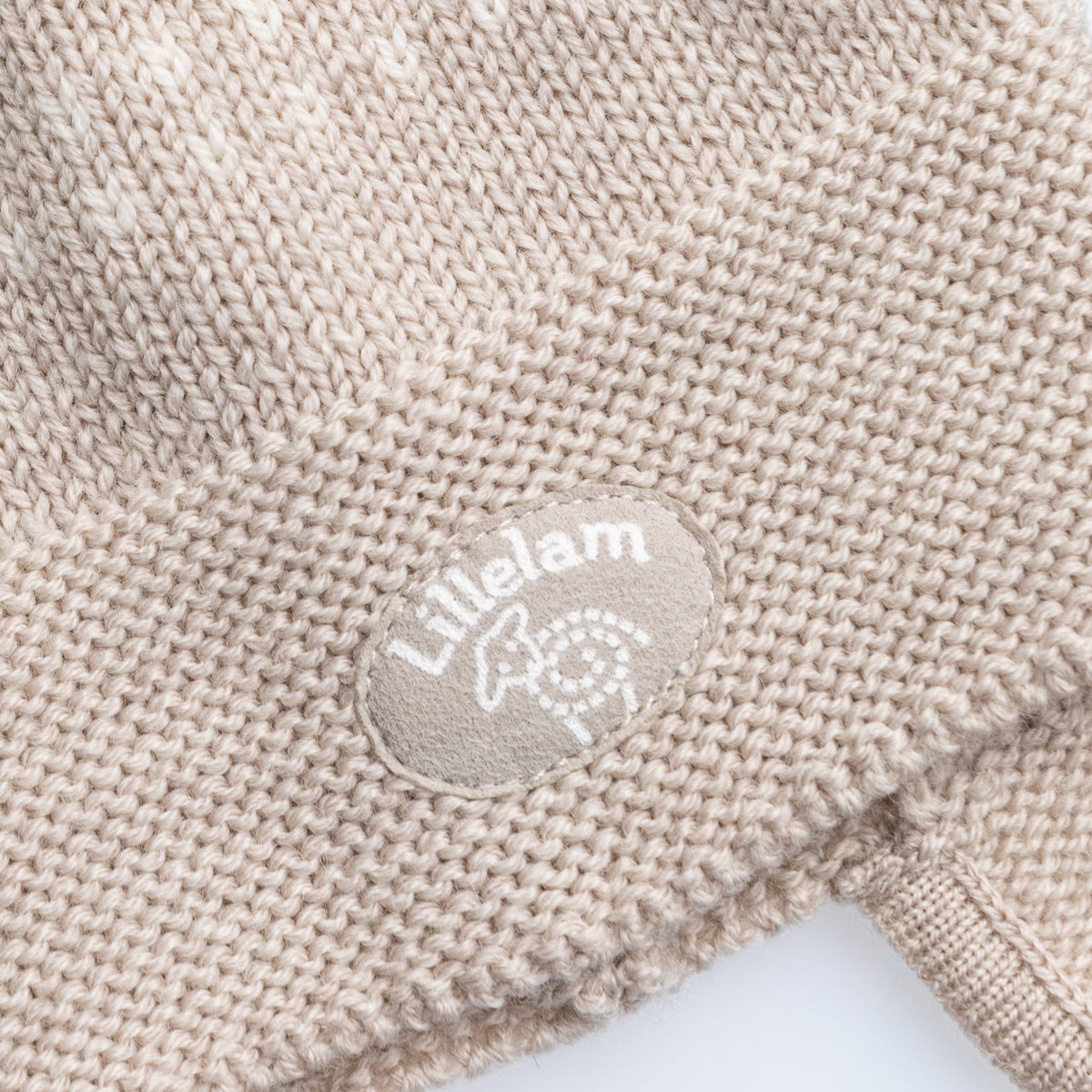 detialed photo of hat, beige knitted, wool, lillelam
