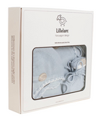 Lillelam baby gift set in a white box with a clear window showing a light blue knit outfit and matching accessories.